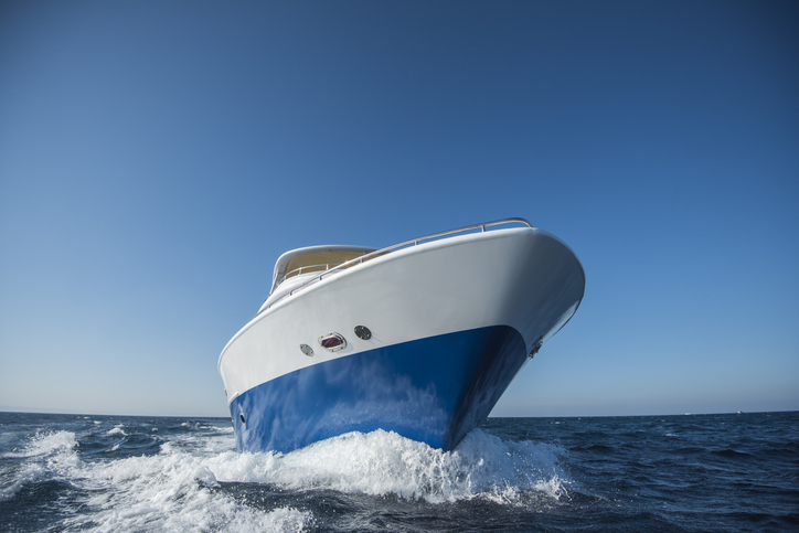 Boat in ocean during day